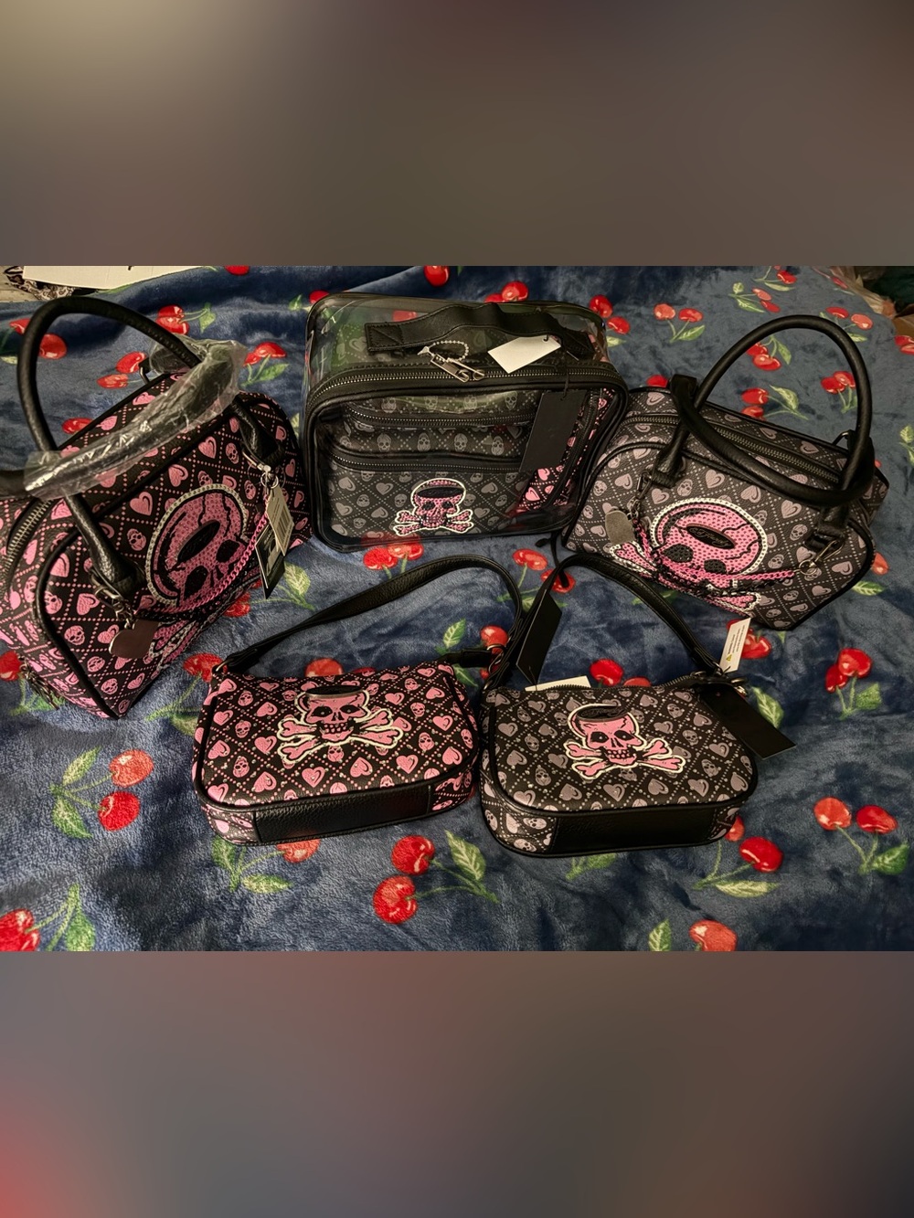 Ed Hardy Pink & Black Skull-Print Women’s Crossbody and Handbag Collection